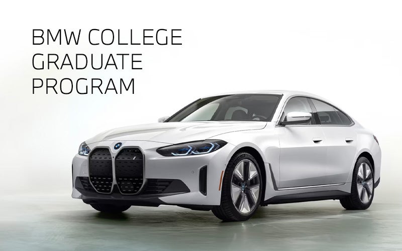 White BMW i4 parked. BMW College Graduate Program. | BMW of Newton in Newton NJ